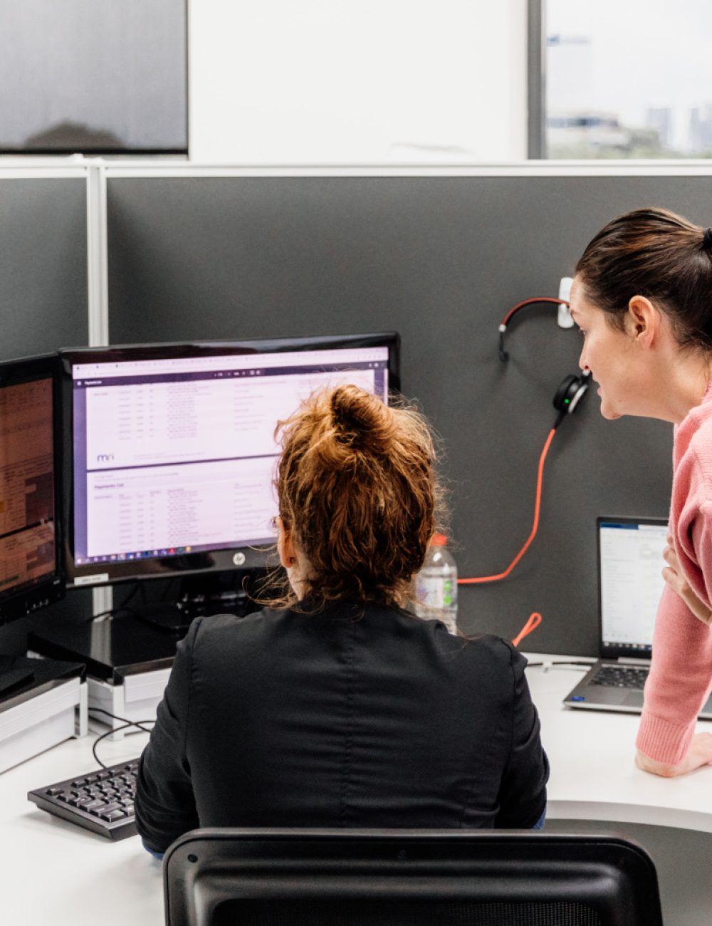 two-women-standing-discussing-what-is-an-internal-audit-1-1536x1024